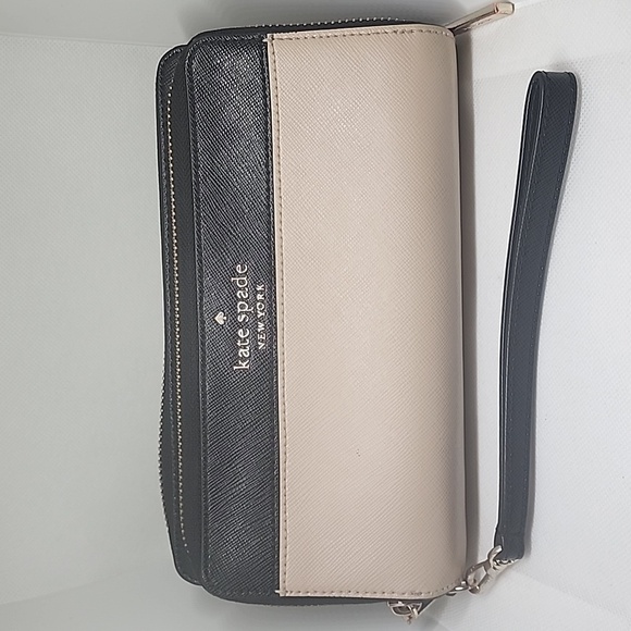kate spade Handbags - PROJECT KATE SPADE ZIP AROUND WRISTLET WALLET. CODE - S362
